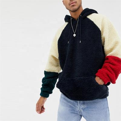 China 2021 Anti-wrinkle Winter 450 Gsm OEM Service 100% Polyester Sharpa Wool Fleece Color Block Oversized Hoodie for sale