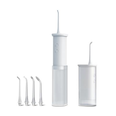 China Ultrasonic Oral Irrigator Water Flosser Tooth Cleaner Mini Portable Dental Irrigator Teeth Pulse Water Flow with 6 Waterproof Modes for sale