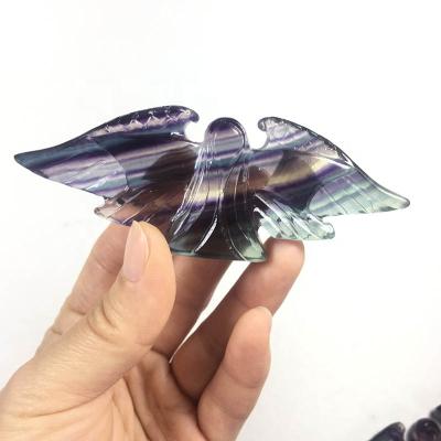 China Donghai Natural High Quality Hand Carved Rainbow Fluorite Quartz Angel Figurines Crystal Angel Carving Statues For Home Decoration for sale