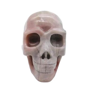 China New Donghai Quartz Crystal Healing Head Natural Pink Opal Skulls Skulls Crafts Wedding Souvenir for sale