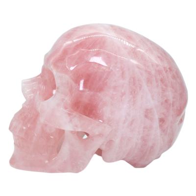 China Donghai high quality hand carved skulls with natural rose quartz crystal skulls decoration for sale