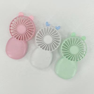 China Conchpeople Mini Macaroon Fan Mini Fan Lithium Battery Air Vent Fans Electric Desktop Charging USB Rechargeable Handheld Small Fan for sale