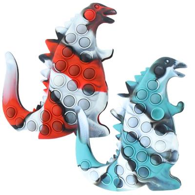 China 2022 Colorful 3D Cartoon Godzilla Snap Finger Toys Jumbo Portable Jumbo Size Reliever Stress Silicone Toy Large for sale