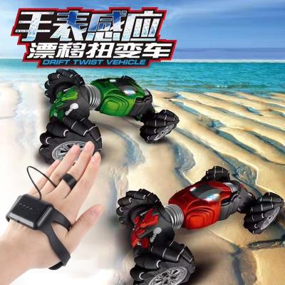 China RC Hobby Bigfoot Music Dance Light On Stunt Double Sided Hand Off Road Twist Watch Remote Control Rc Drift Car for sale