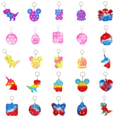 China 2021New Boys Christmas mini llaveros key chain popular squeeze durable other toys his backpack fidgety person toy keychains llaveros on bag for sale