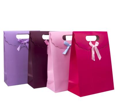 China Recyclable Colored Paper Shopping Bag, Custom LOGO Printed Fancy Paper Gift Bag for sale