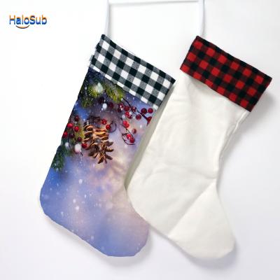 China Christmas Decoration HaloSub Sublimation Christmas Stocking Hot Selling Empty Christamas Empty Gift Knock Out Black Red Plaid Gift Bag for sale