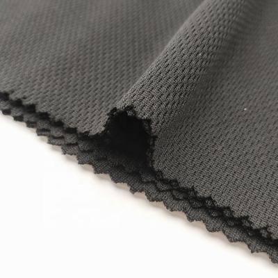 China 100D 100%Polyester Black Interlock Tank Top Bird Eye Anti-Static Weft Knitted Fabric for sale