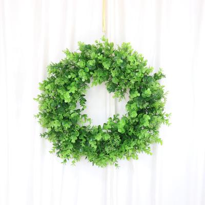 China Rural Style 19 Inch Artificial Eucalyptus Christmas Wreath For Festival Party Decoration Plastic Straw Ring Wall Door Deco for sale