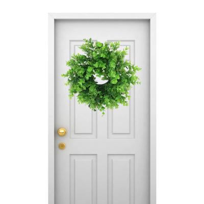 China Home Decoration 13inch Green Artificial Eucalyptus Holiday Decoration Garland Christmas Plastic Wreaths On Lintel And Wall for sale