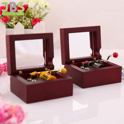 China Suitable for all occasions operate wooden hand cranked music box with 18 note musical movement for sale