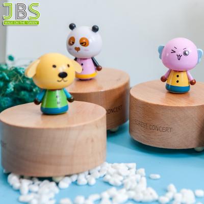 China Suitable for all occasions roll up wooden music box with lovely cardboard design on top for sale