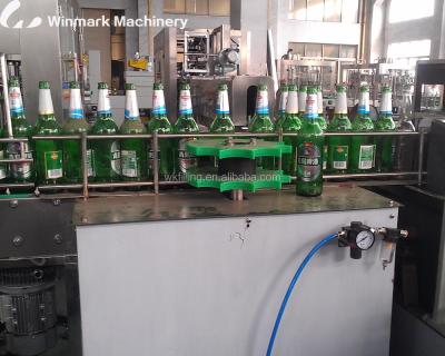 China Bottled Water Filling Machine Glass Bottle Washer for sale