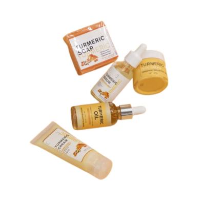 China Skin Revitalizer Turmeric Series 5 Pieces Set Skin Care Cream Facial Serum Facial Soap Facial Massager Detergent Oil for sale