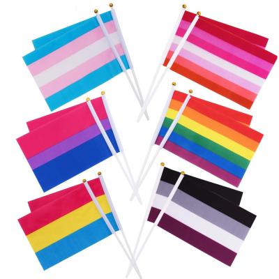 China 1.Small Campaign Rainbow Cheap Mini Hand Flag Custom Rainbow Polyester Printed Gay Pride Gay Hand Flag for sale