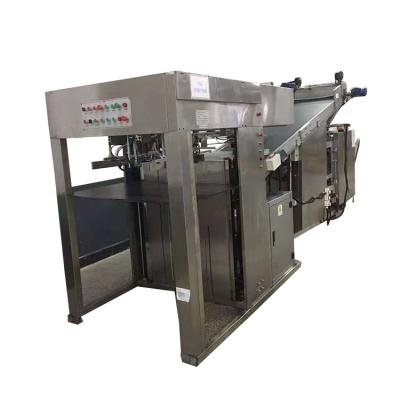 China High efficiency automatic feeding, dispersing and packaging equipment for jigsaw puzzle by manipulator for sale