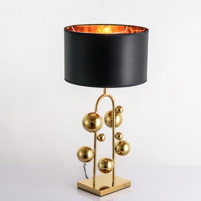 China Easy to install AOSIHUA designer gold metal table lamp modern Nordic room model hotel art decorative table lamp for sale