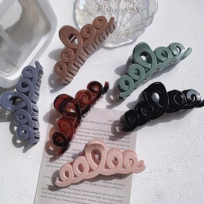 China Simple temperament and cute 2021 new arrivals solid color girls hair claw large hair accessories claw plastic hair clips women hair claw clips for women for sale