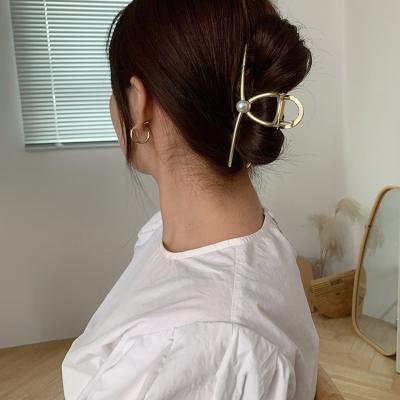 China For the new summer thick fine hair 2021 minimalist pearl embellished alloy hair cross hollow claws for sale