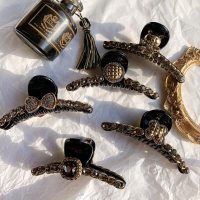 China Simple temperament and cute Shell Claws Hair Claw Luxury Matel French design barrettes tortoise hair clip for women hair claw for sale