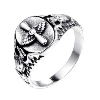 China Trendy Best Selling Fashion Wing Bird Cross Animal Rings Cross Titanium Steel Ring Male Rings For Men for sale