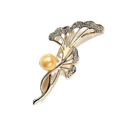 China Luxury high quality fashion shiny flower tree alloy brooch pins inlay import rhinestone brooch pins for ladies for sale