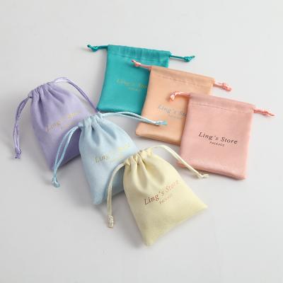 China Fancy Trendy Casual Personalized Custom Drawstring Jewelry Bags Pouches Chic Wedding Favor Bags Flannel Velvet Bags for sale