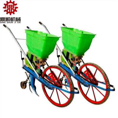 China Agricultural Multifunctional Peanut Soybean Fertilizer Planter Push Hand Push Corn Planter Small for sale