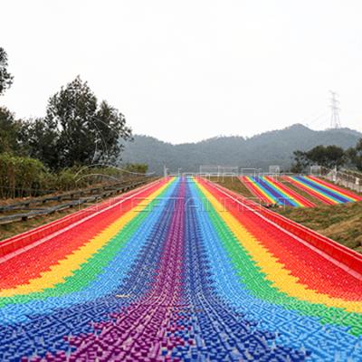 China Outdoor Scenic Area Amusement Non-Powered Equipment Scenic Area Children And Adults Plastic Rainbow Snow Slide Te koop