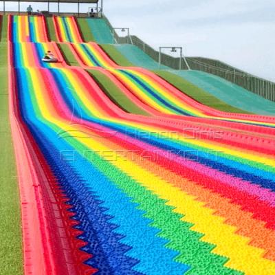 China Scenic Area Theme Park Adult Children's Rainbow Dry Snow Colorful Low Price Rainbow Slide Te koop