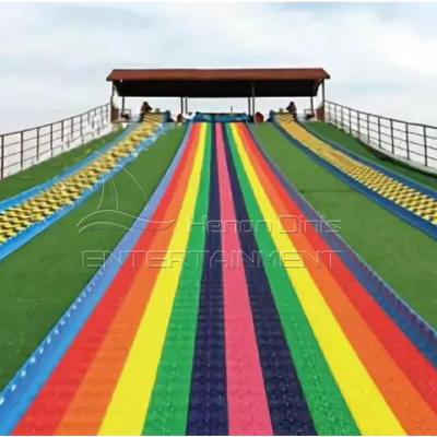 China Amusement Park Dry Adult Scenic Equipment Entertainment Farm Scenic Area Scenic Area Snow Rainbow Plastic Slide For Sale Te koop