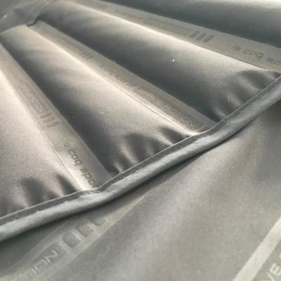 China Durable 100%RPET Fabric--Down Coat Fabric Two Layer Woven Free Quilting No Seam Light And Warm Microfiber Polyester Fabric for sale