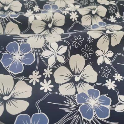 China Antistatic 75D*200D Twill Polyester Printed Peach Skin Fabric For Beach Pants for sale