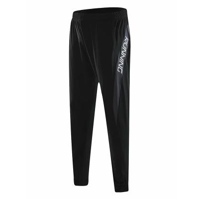 China Autumn new style breathable black letter printing quick-drying sports pants sports jogging pants for sale