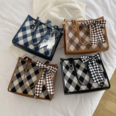 China Fashion ladies famous brand new wholesale luxury women handbags lattice fashionable handbags with bow for sale