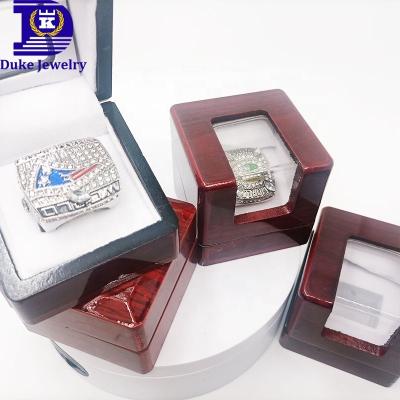 China DUKE Dropping Shipping High End Stock Jewelry Packaging Wooden Box Glass Top Jewelry Red Wooden Box For Champion Rings for sale