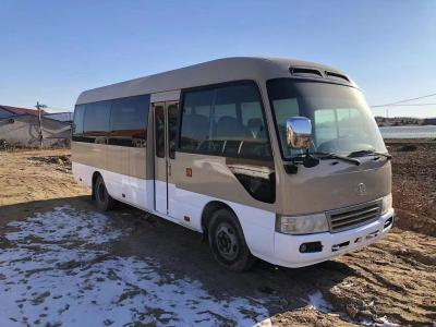 Китай Toyota Coaster Bus 23 Seater Toyota Mini Bus 2TR Gasoline Engine 2nd Hand School Bus продается