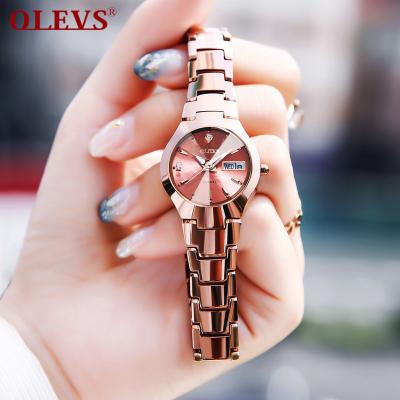 China Automatic date OLEVS 8697 women hand watch fashion luxury quartz watches waterproof tungsten quartz watch luminous ladies watch for sale