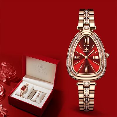 China Water Resistant Women Watches in Drop Oval Creative Women Wristwatches Quartz Water Unique Design Gold Watches for sale