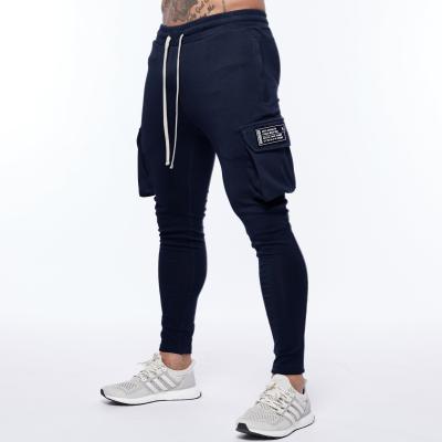 China Anti-Wrinkle Mens Cotton Joggers Pants Street Style Hip Hop Pants Autumn Winter GYM Loose Drawstring Sweatpants for sale