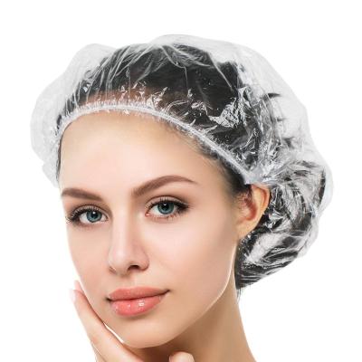 China Sustainable 100pcs Disposable Shower Cap Plastic Waterproof Headgear Hotel Hair Dye Shower Cap Transparent Plastic Beauty Salon Cap Cling for sale