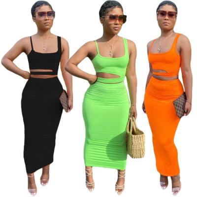 China Breathable Women Summer Clothing Women Solid Color Two Piece Hollow Out Casual Ladies Crop Top And Skirt Suit for sale