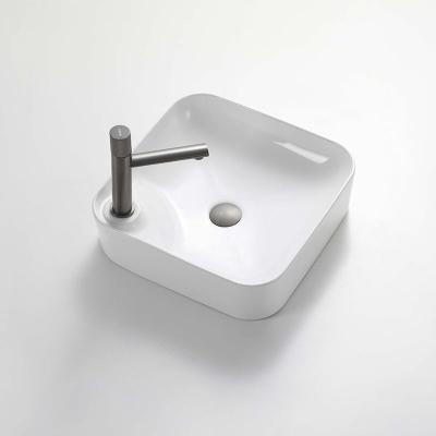 China New Design Easy Clean White Ceramic Product Edge Ceramic Counter Top Wash Basin For Bathroom Hotel Bathroom for sale