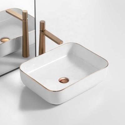 China Modern Home Modern White Rectangular Countertop Bathroom Sink Hand Ceramic Basin Art Basin for sale