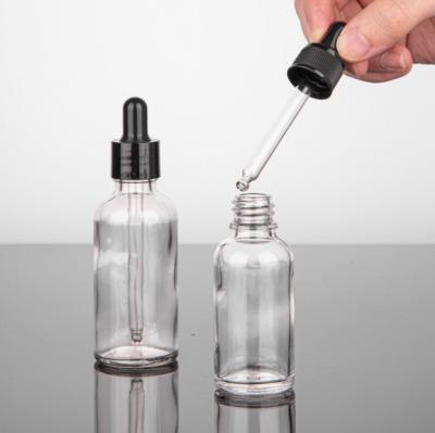 China Liuguang Cosmetic Wholesale Factory Transparent Essential Oil Bottle With Dropper/Screw Lid for sale