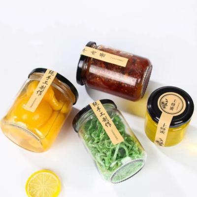 China 100ml 195ml Round Glass Food Jam Jars Glass With Lid Storage Marine Honey Jar For Food for sale