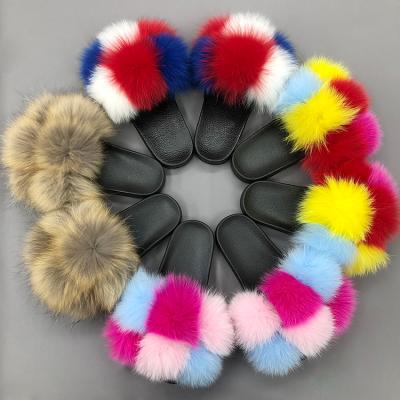 China Lightweight Mix Colors Large Fur Pom Pom Slides Slippers Wholesale Genuine Fluffy Raccoon Real Fox Fur Slides Slippers for sale