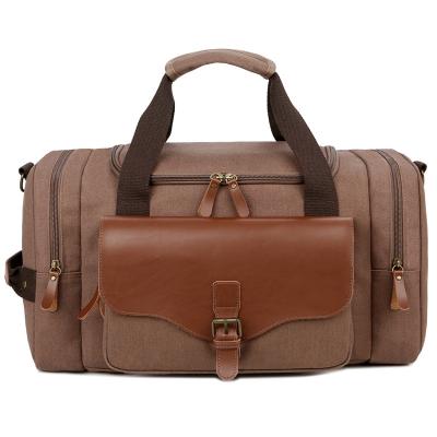 China Soid Gentleman Women Business Leisure Travel Bag Luggage Handbag Canvas Garment Duffle Bag Leather Travel Bags for sale