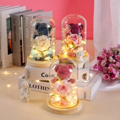 China Friends' Perfect Valentine's Day Gift Pink Preserved Moss Bear with Bright Colors for sale