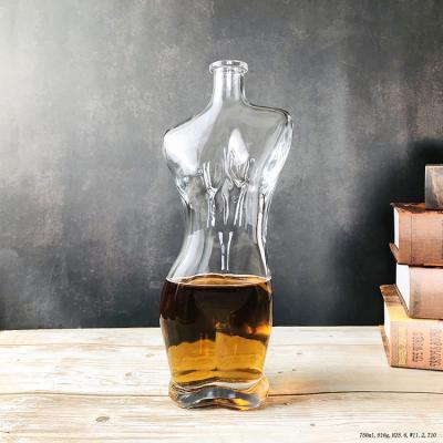 China Glass Beverage Factory Price 750ml Women Shaped Vodka Liquor Bottle for sale